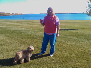 Labradoodle and mum by lake