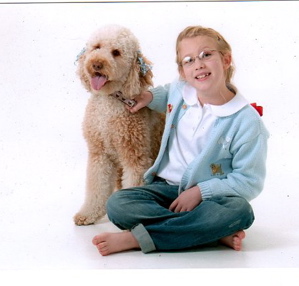 Labradoodle and little girl