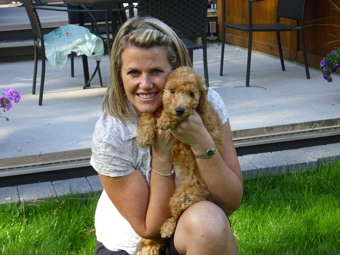 Labradoodle puppy and family